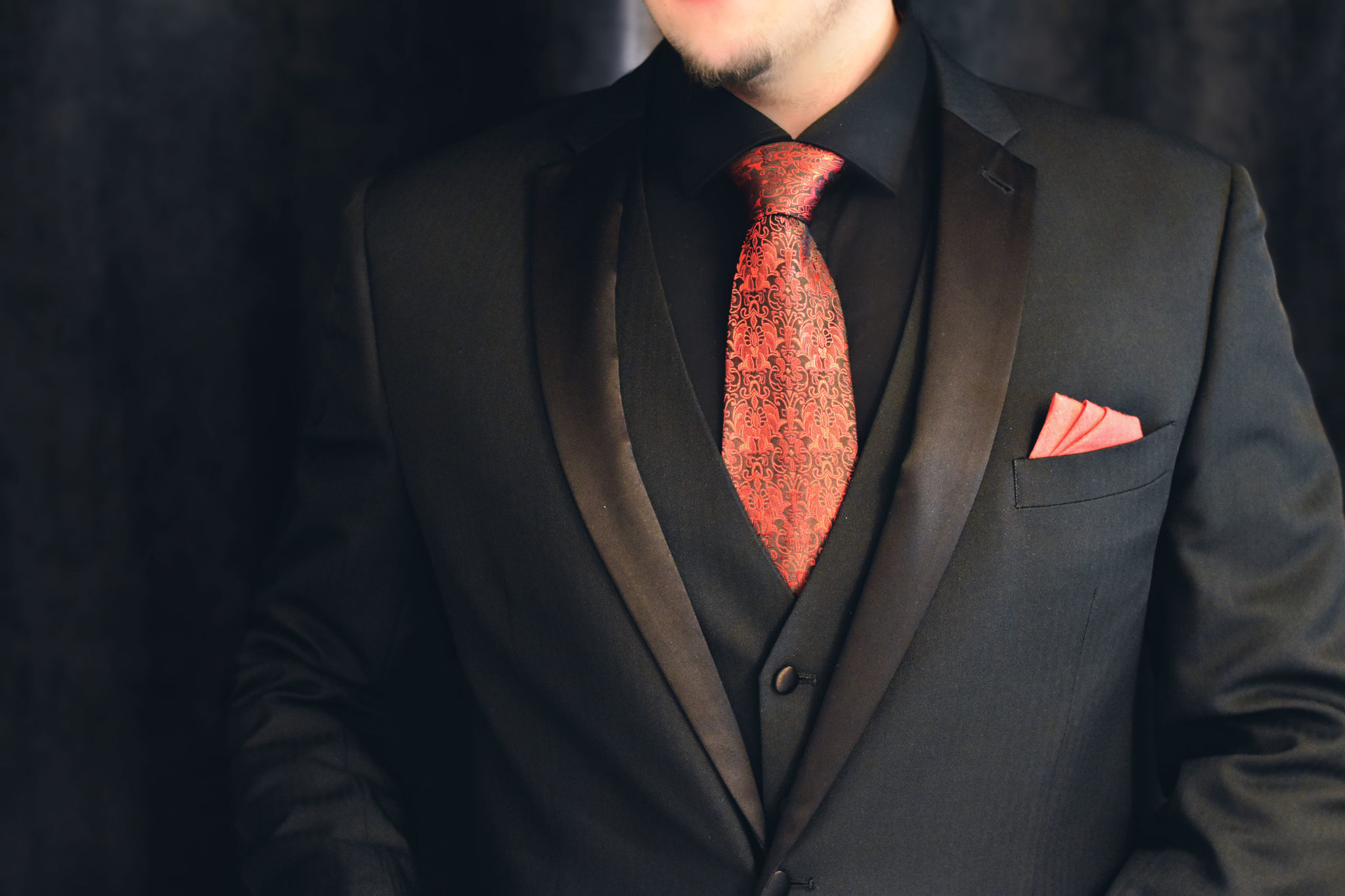 Red and black floral necktie