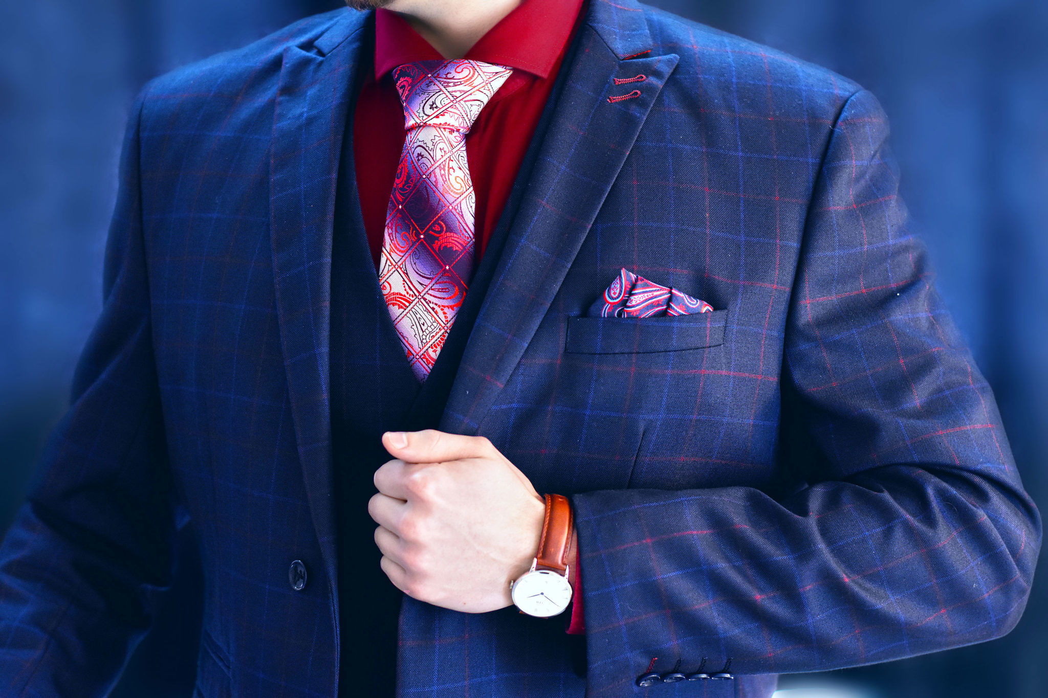 Men's silk blue and red checkered paisley necktie