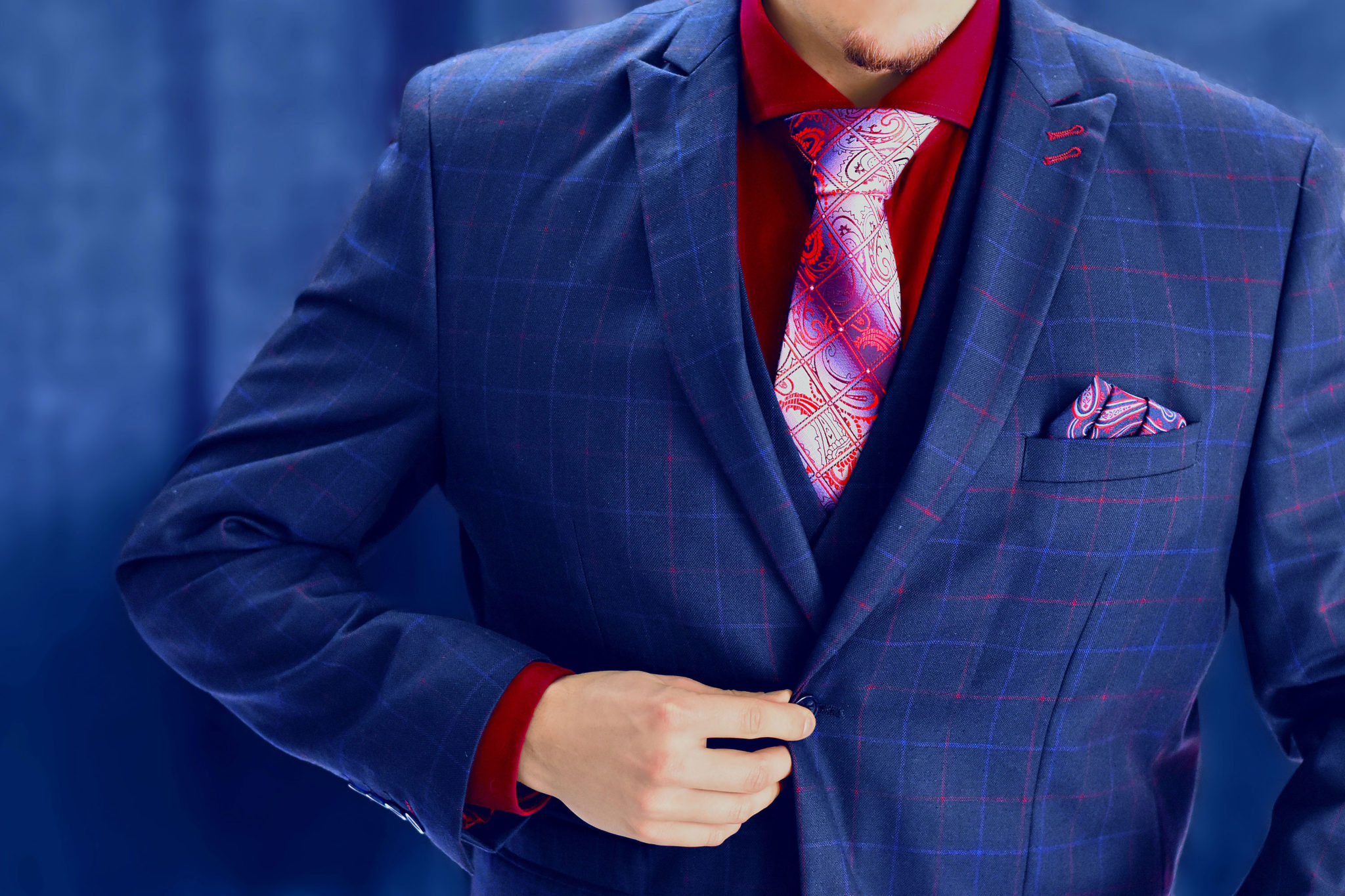 Men's silk blue and red checkered paisley necktie