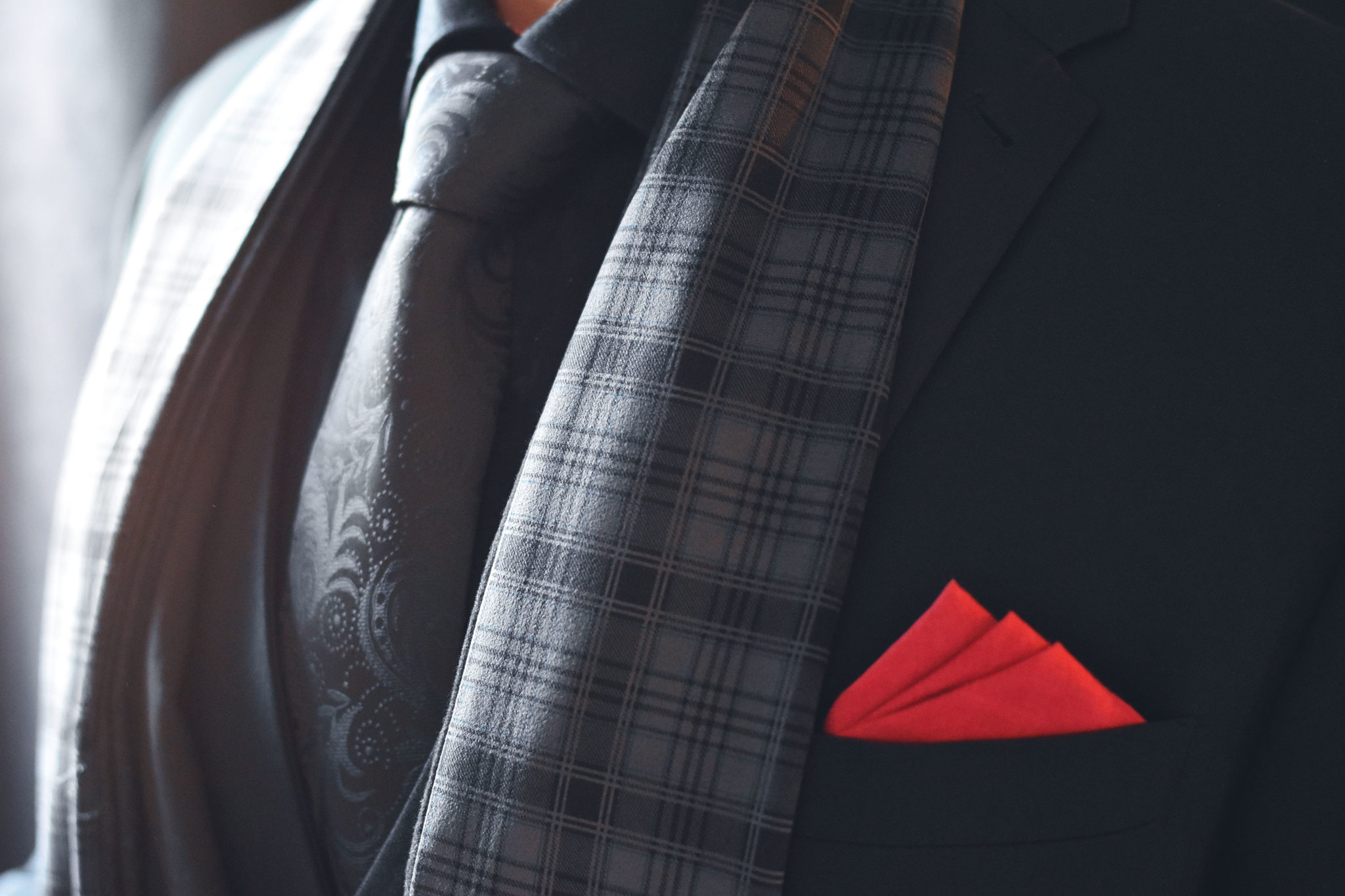 Elegant men's silk and wool scarf in a plaid checked grey pattern
