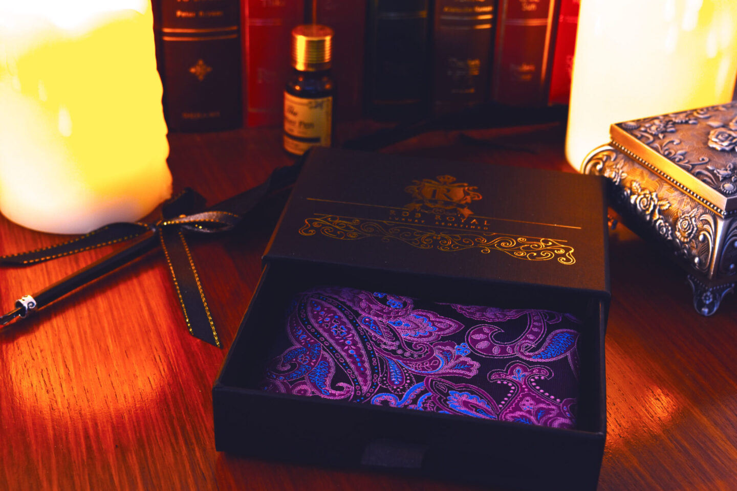 Pink and purple pocket square with blue paisley pattern 